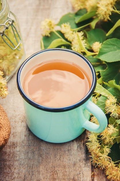 Linden tea and flowers. Selective focus.