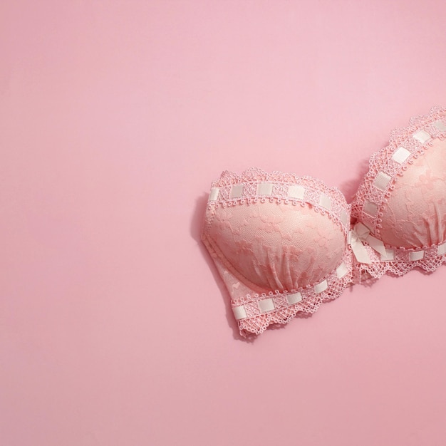 Lingerie bra on a pink