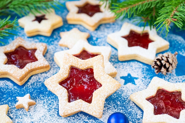 Linzer cookies Christmas Austrian cookies with red jam sprinkled with powdered sugar Copy space