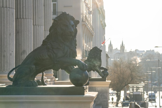 Lions in the building of the Congress of Deputies and columns of the main facade in Madrid