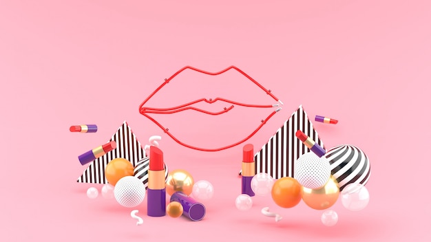 Lip light middle of a lipstick and colorful balls on a pink space