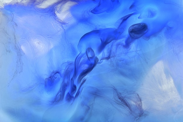 Liquid fluid art abstract background Blue acrylic paint underwater galactic smoke ocean