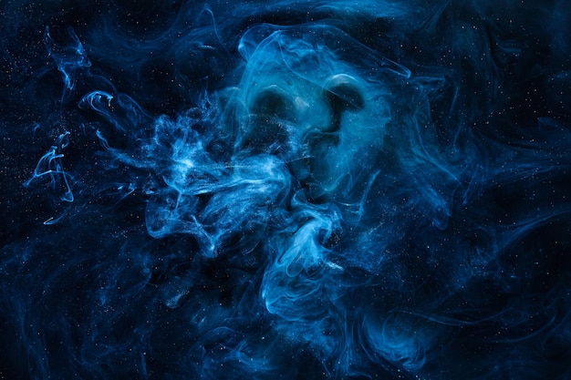 Liquid fluid art abstract background. Blue acrylic paint underwater, galactic smoke ocean