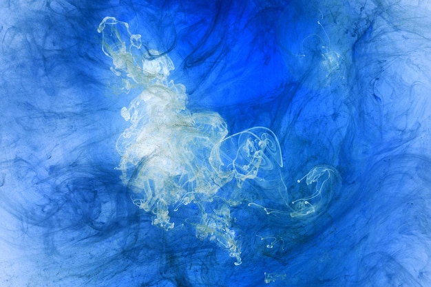 Liquid fluid art abstract background Blue acrylic paint underwater galactic smoke ocean