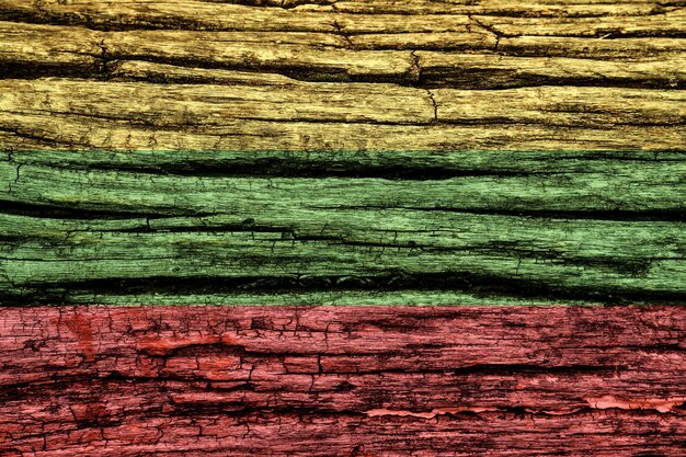 Lithuania flag on an old decrepit wooden surface