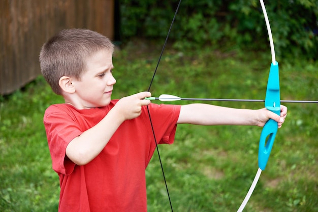 Little archer with bow and arrow