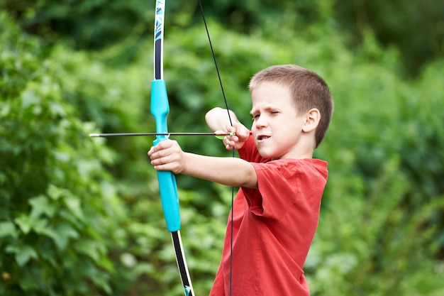 Little archer with bow and arrow