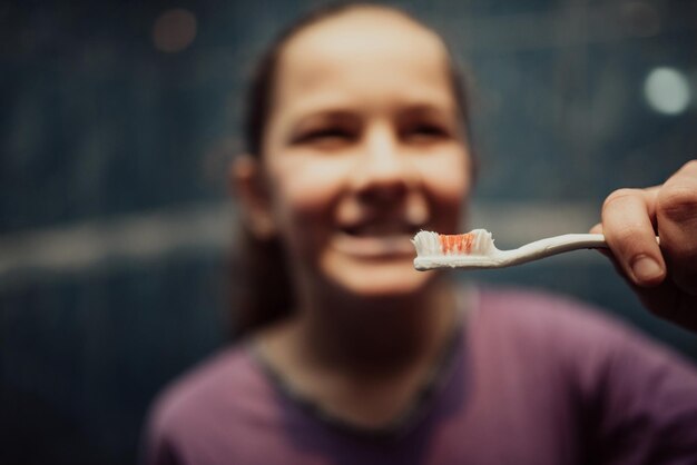 Little beautiful girl brushing teeth healthy concept