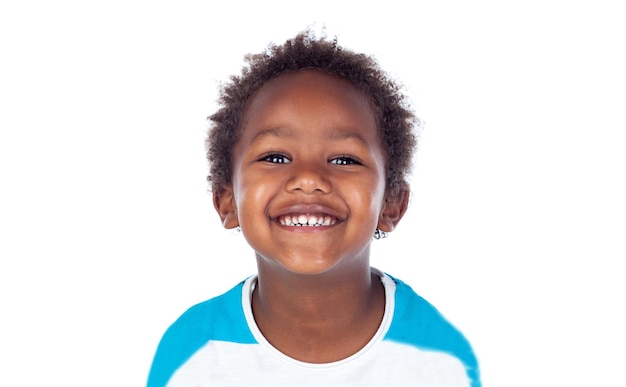 Little black child boy smiling and looking at camera on white  background