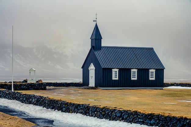 The little black church of Budir in the south part of Snaefellsnes Peninsula Iceland