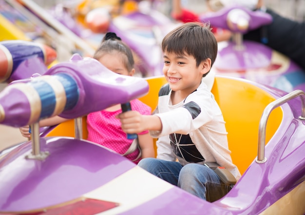 Little boy in amusement park