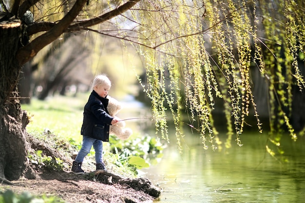 Little boy by the river.