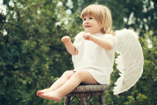 Little boy dressed as angel