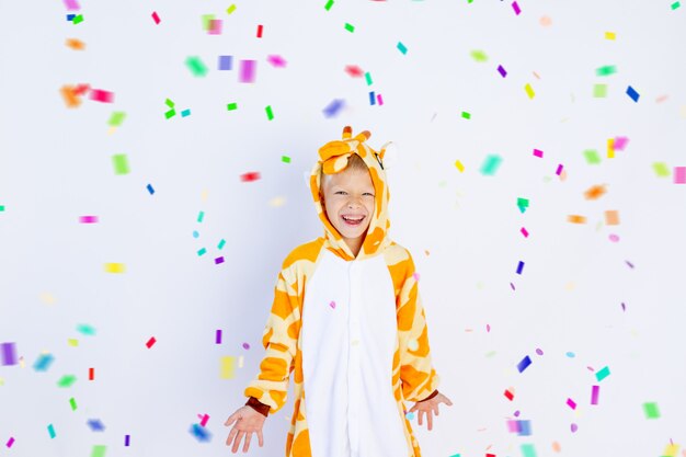 Little boy in a funny costume on a white isolated background