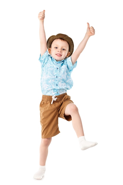 Little boy jumping and having fun isolated on white