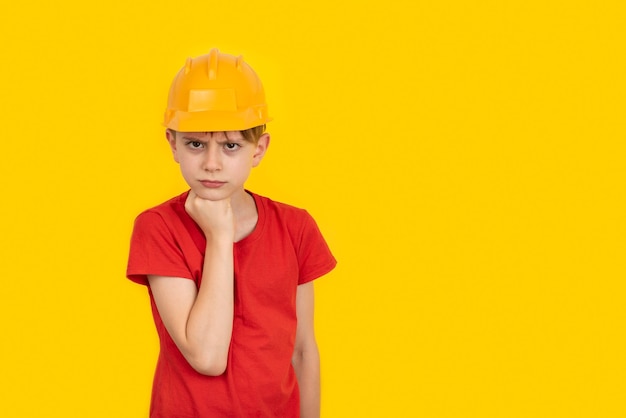 Little boy in an orange helmet