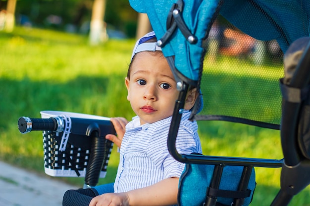 little boy playing in the park