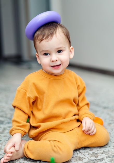 Little boy playing with toys Small playful child activities