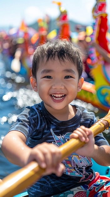 a little boy smiling and holding a wooden pole in his hand