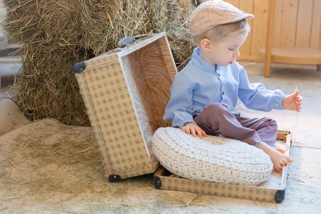 Little boy next to the spring decorated place interior itchy feet