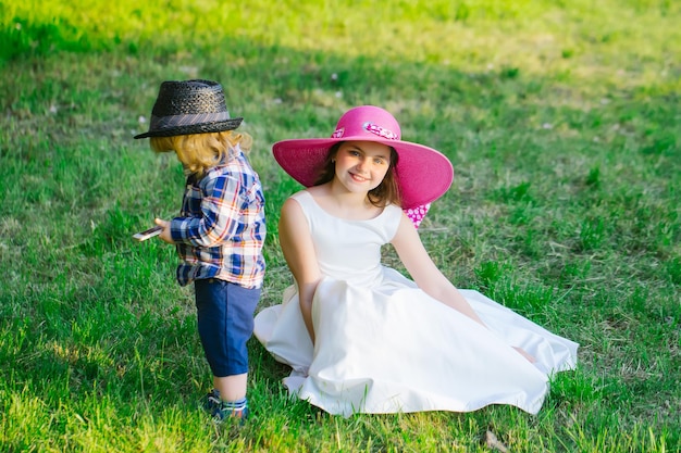 Little boy and stylish girl