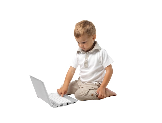 Little boy using a laptop