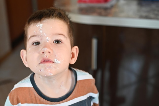 Little boy with an allergic rash on his face Kid boy with chicken pox Mosquito bites roseola rubella measles