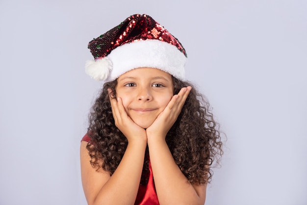 little Brazilian girl dressed with christmas costume