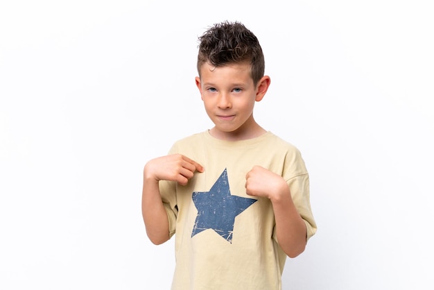 Little caucasian boy isolated on white background pointing to oneself