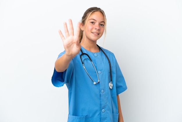 Little caucasian girl disguised as surgeon isolated on white background happy and counting four with fingers