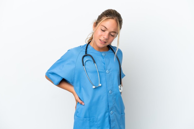 Little caucasian girl disguised as surgeon isolated on white background suffering from backache for having made an effort