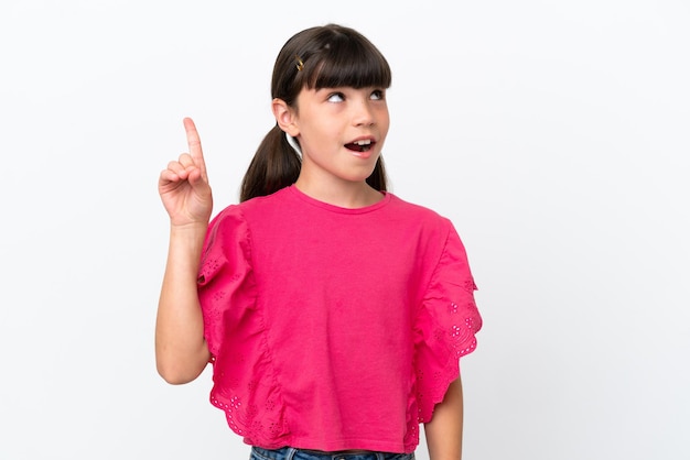 Little caucasian kid isolated on white background intending to realizes the solution while lifting a finger up