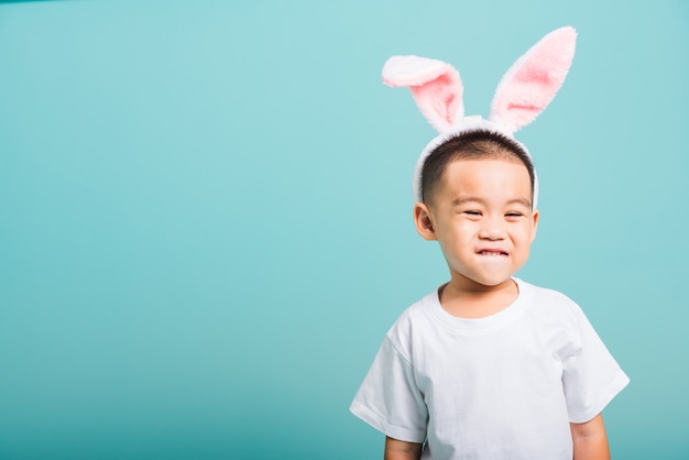 Little child boy smile beaming wearing bunny ears