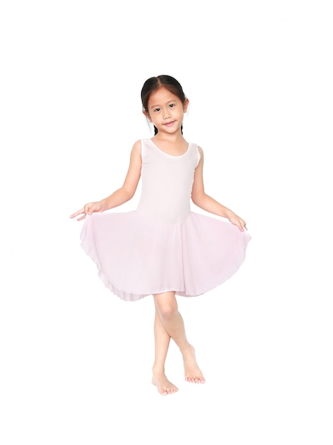 Little child girl dreams of becoming a ballerina