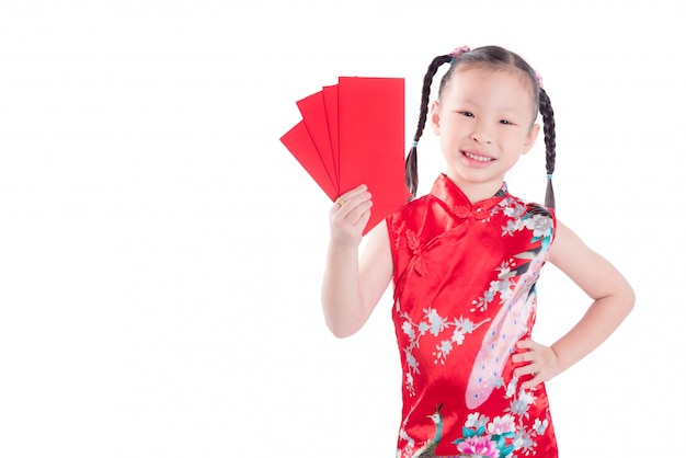 Little chinese girl in red color traditional dress