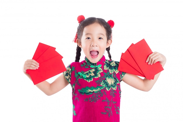 Little chinese girl in red color traditional dress 