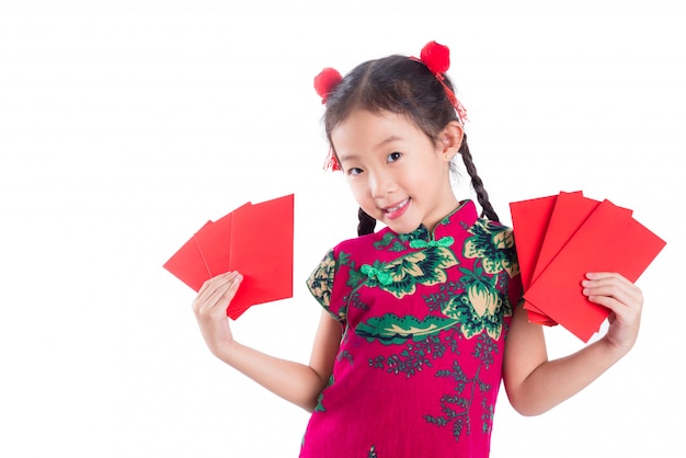 Little chinese girl in red color traditional dress 