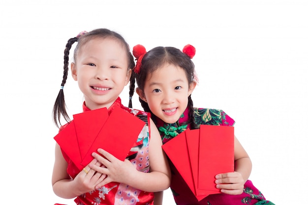 Little chinese girls in red color traditional dress