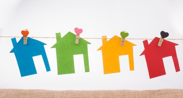 Little colorful paper houses attached on a string