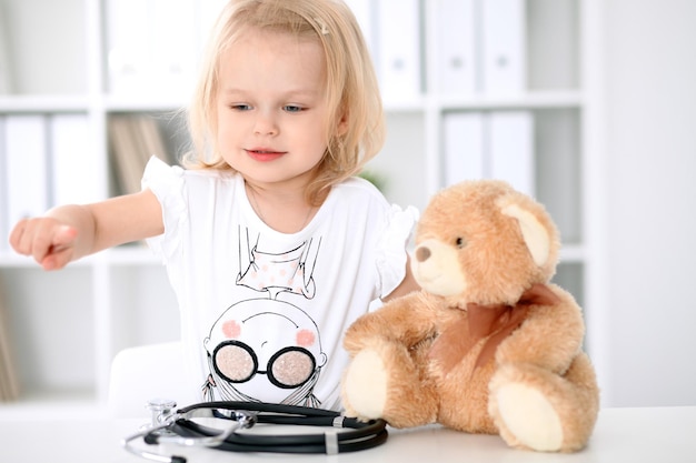 Little girl after health examining. Medicine and health care