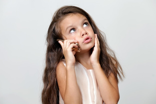 little girl calling by phone