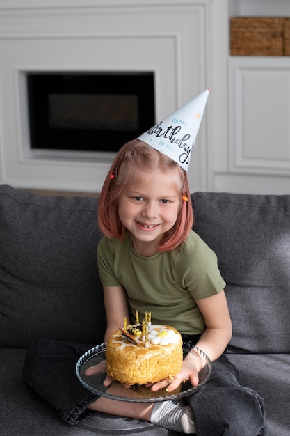 Little girl celebrating her birthday at home