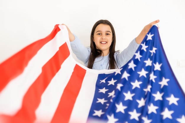 little girl celebrating us independence day.