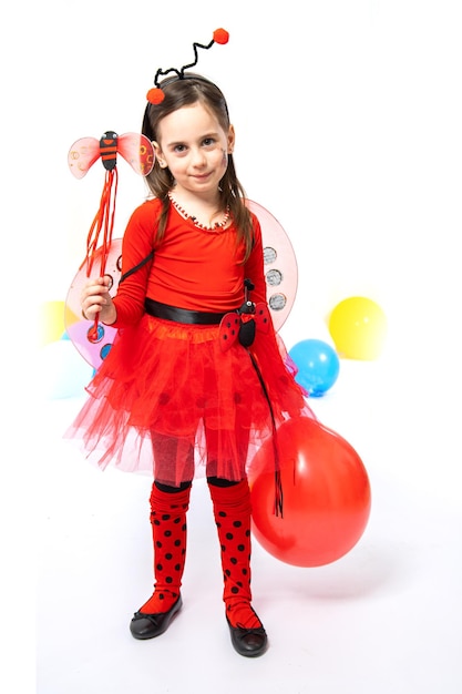 Little girl dressed as a bee on a white background Carnival Purim Halloween