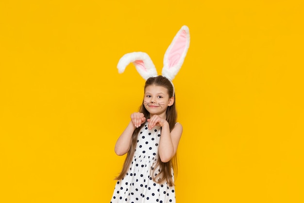 A little girl in an Easter bunny costume Easter Holiday a child dressed in fancy Easter bunny ears