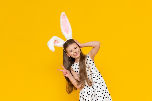 A little girl in an Easter bunny costume Easter Holiday a child dressed in fancy Easter bunny ears