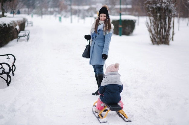 Little girl enjoying sledding