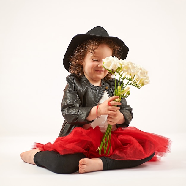 Little Girl Fashion Model With Black Hat