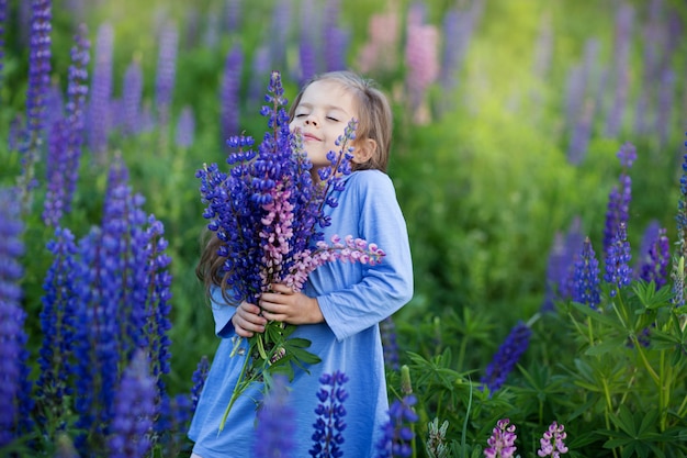 Little girl in a field of flowers