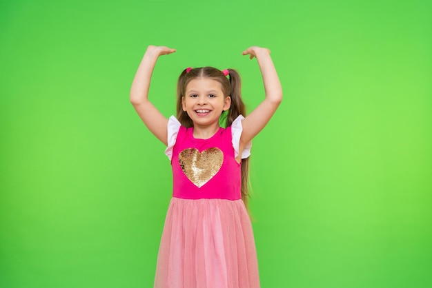 A little girl holds your advertisement or ad over her head